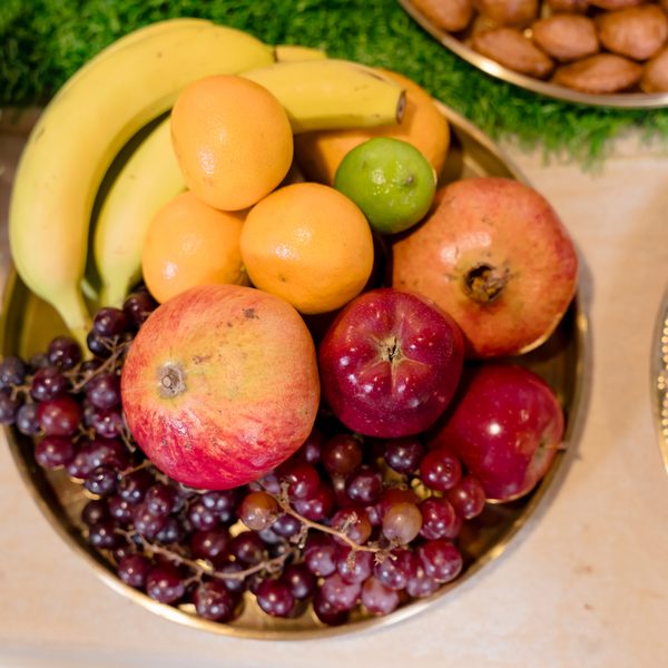 Fresh fruit display on a gold tray